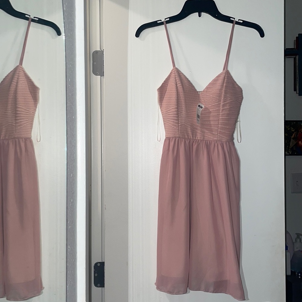 Pink party dress.